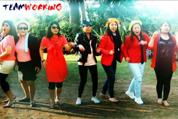 A group filming a music video in a single unbroken take