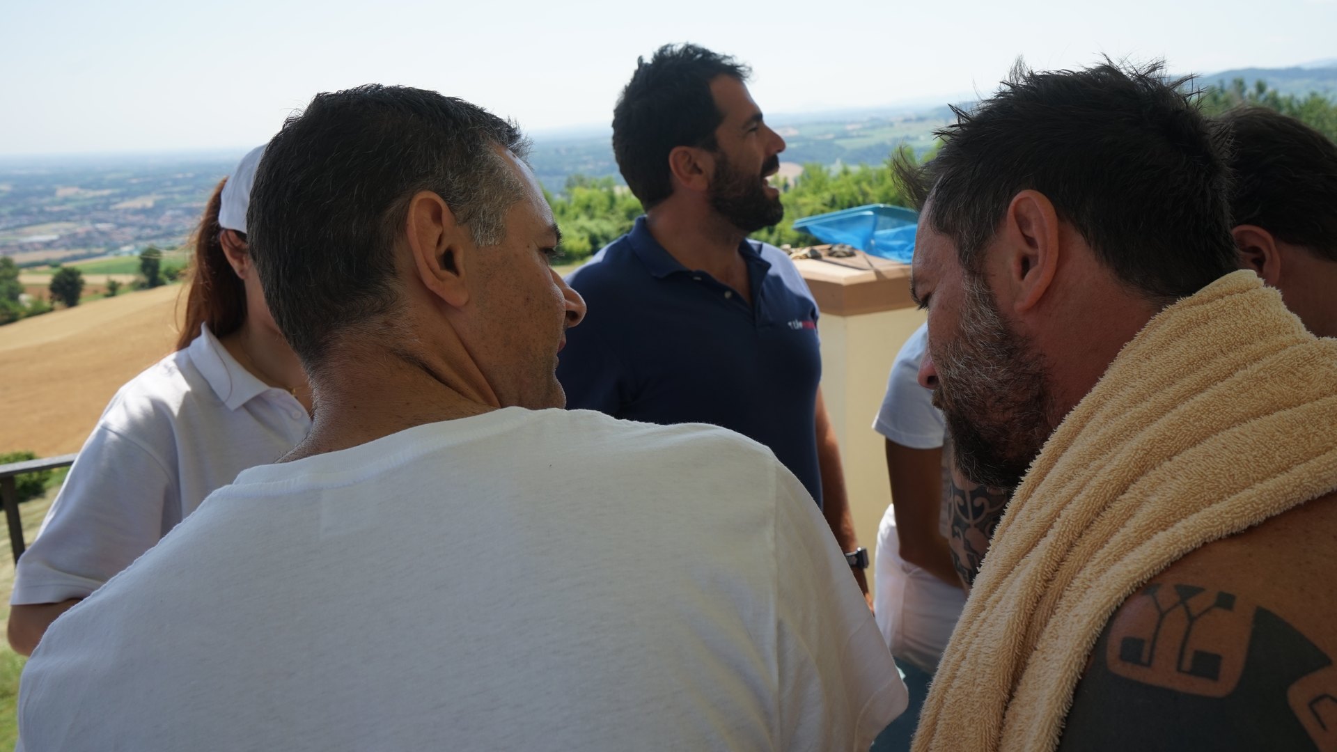 Three colleagues talking things through outdoors